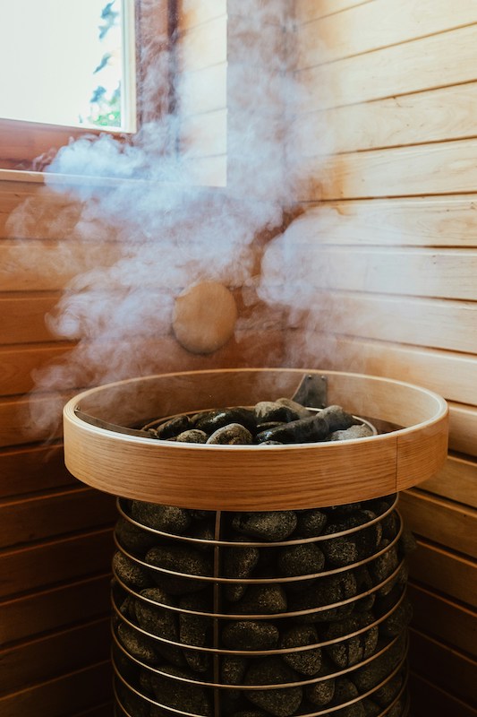 sauna steam over rocks